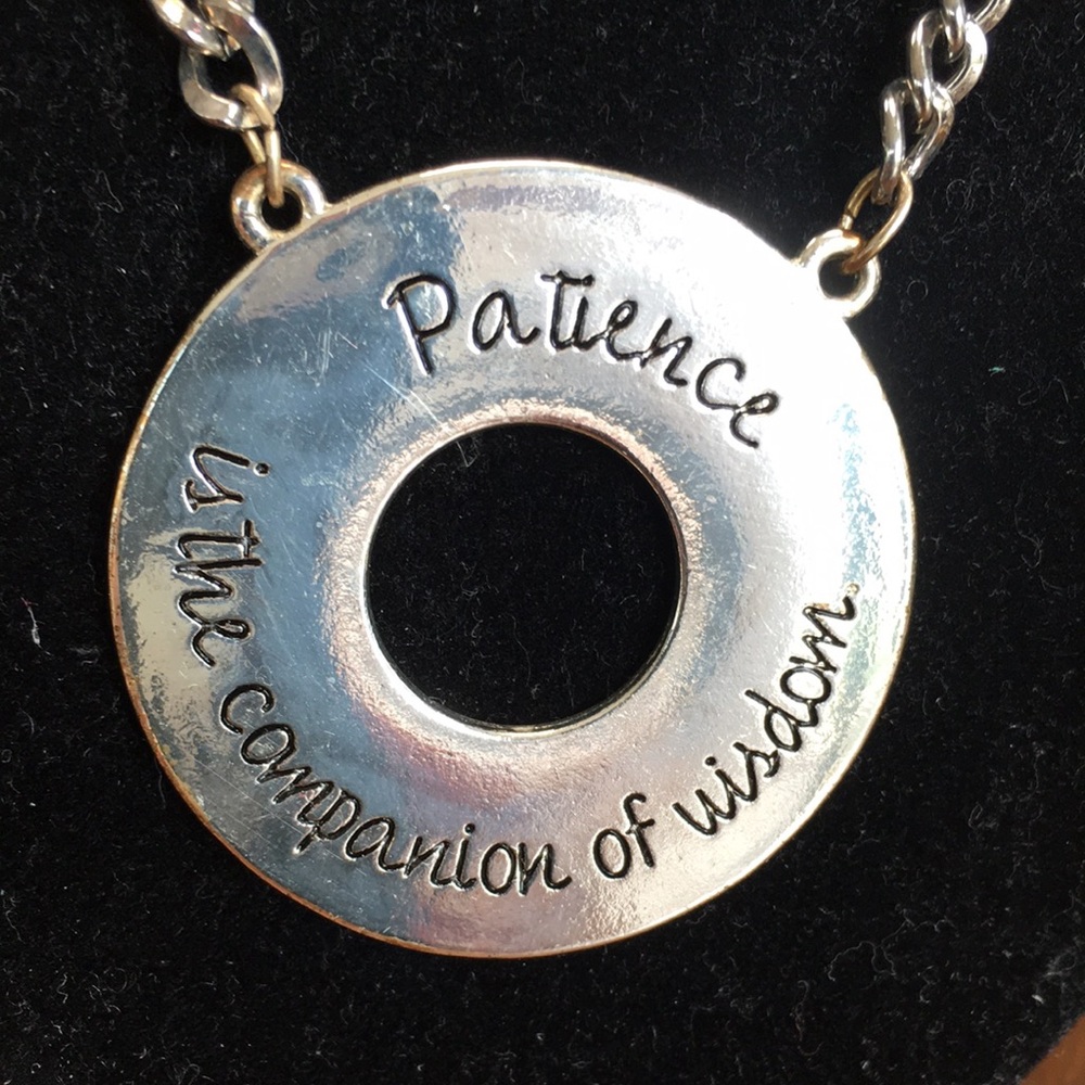 Patience saying necklace, silver toned, 10” drop. Clasp closure.